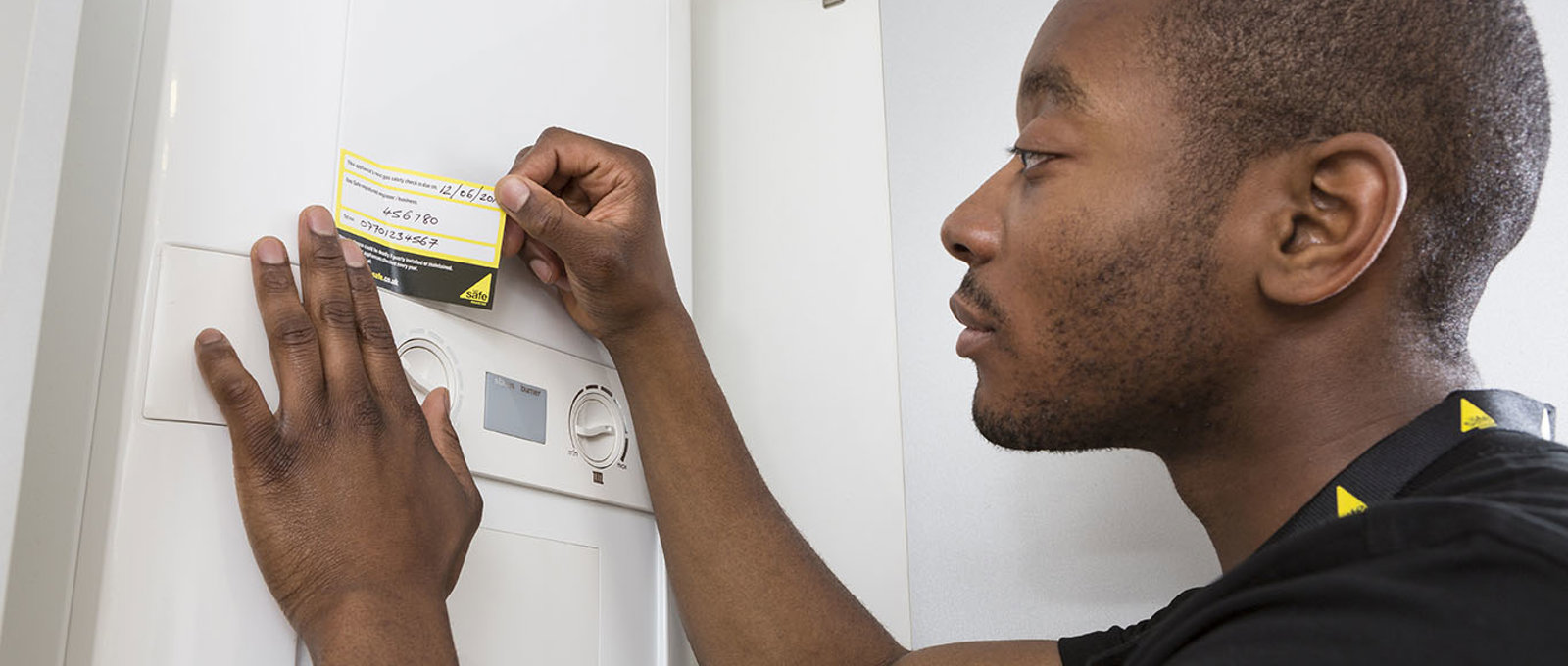 Engineer Applying Annual Service Sticker
