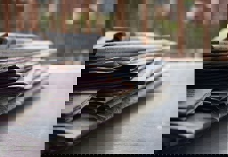 Stack of newspapers on a table