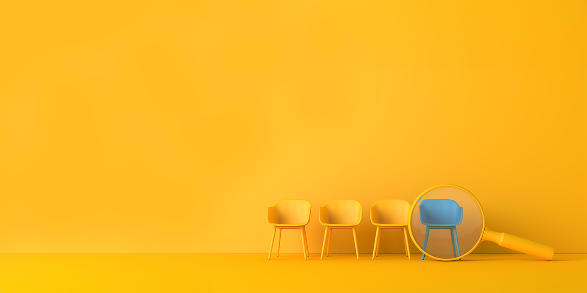 Job search, yellow chairs with a magnifying glass over a blue chair