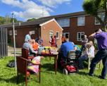 Customers at a community day of action event in Pennytown, Somercotes
