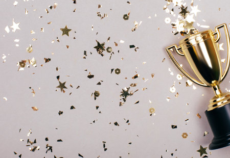 Gold Trophy With Gold Confetti