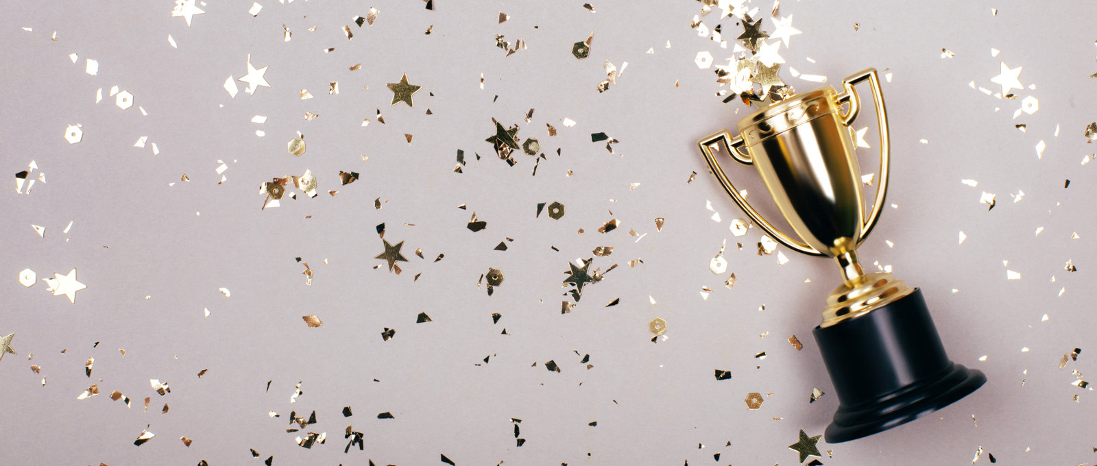 Gold Trophy With Gold Confetti