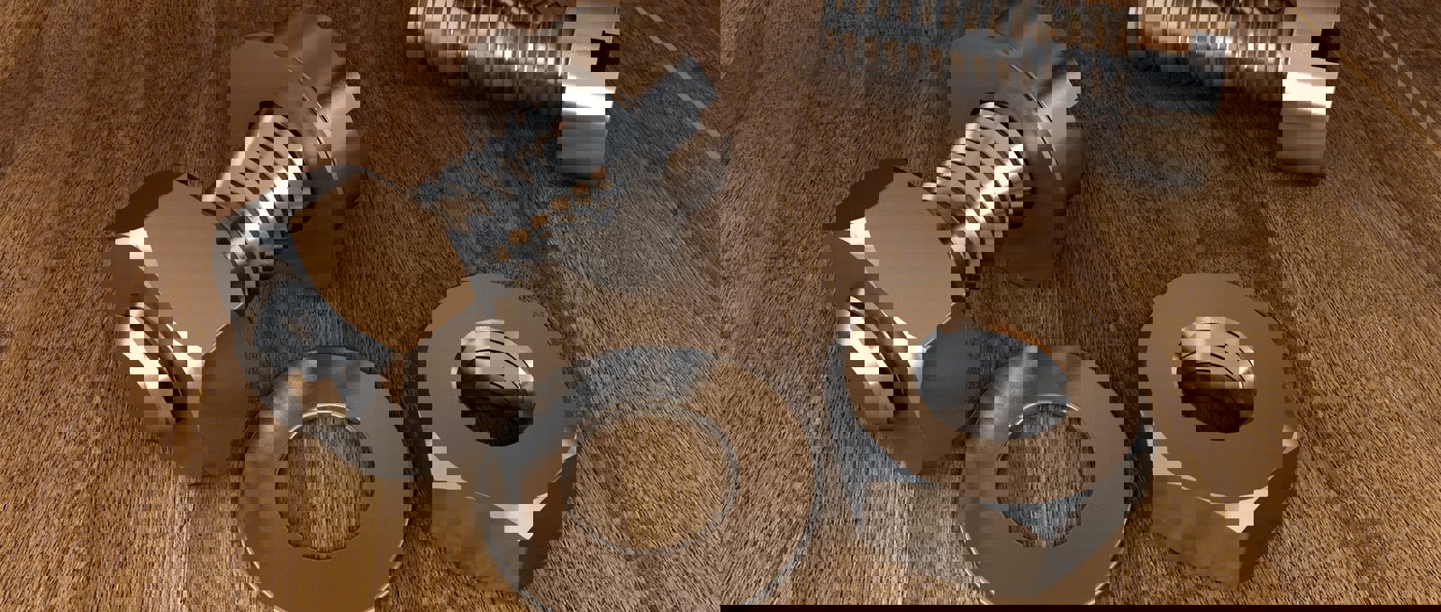 Close-up photograph of metal nuts and bolts