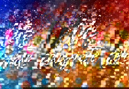 Image of the words 'Let's celebrate' written over an abstract image of sparkles of light