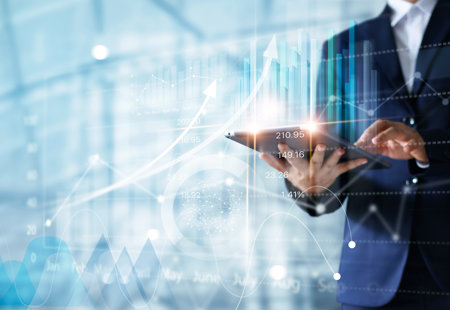 Businessman Using Tablet Analyzing Sales Data Economic Growth Graph Chart