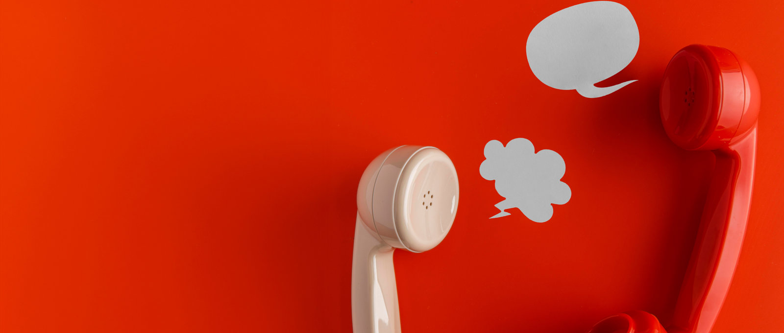 Top View Telephone Receivers With Chat Bubbles