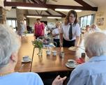School choir performing for Warwick Court, Daventry customers 15