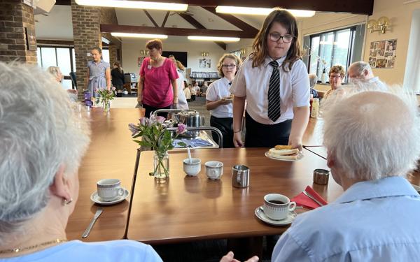 School choir performing for Warwick Court, Daventry customers 15