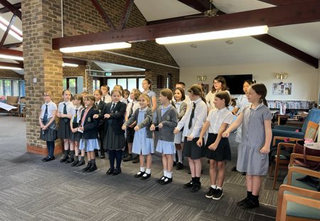 School choir performing for Warwick Court, Daventry customers 19