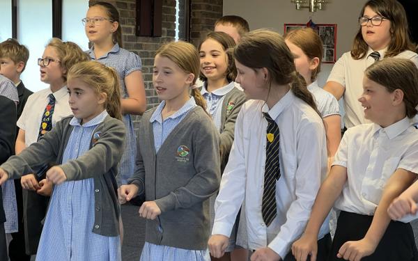School choir performing for Warwick Court, Daventry customers 6