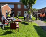 Customers at a community day of action event in Pennytown, Somercotes